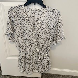Blue flowered wrap tie blouse